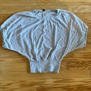 Anthropologie Grey Terry Knit Top. Elastic fitted waist super flowy on top.